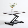 Table pliante réglable en hauteur à finition effet marbre, coloris blanc et noir